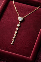 Diamond necklace on a burgundy velvet surface