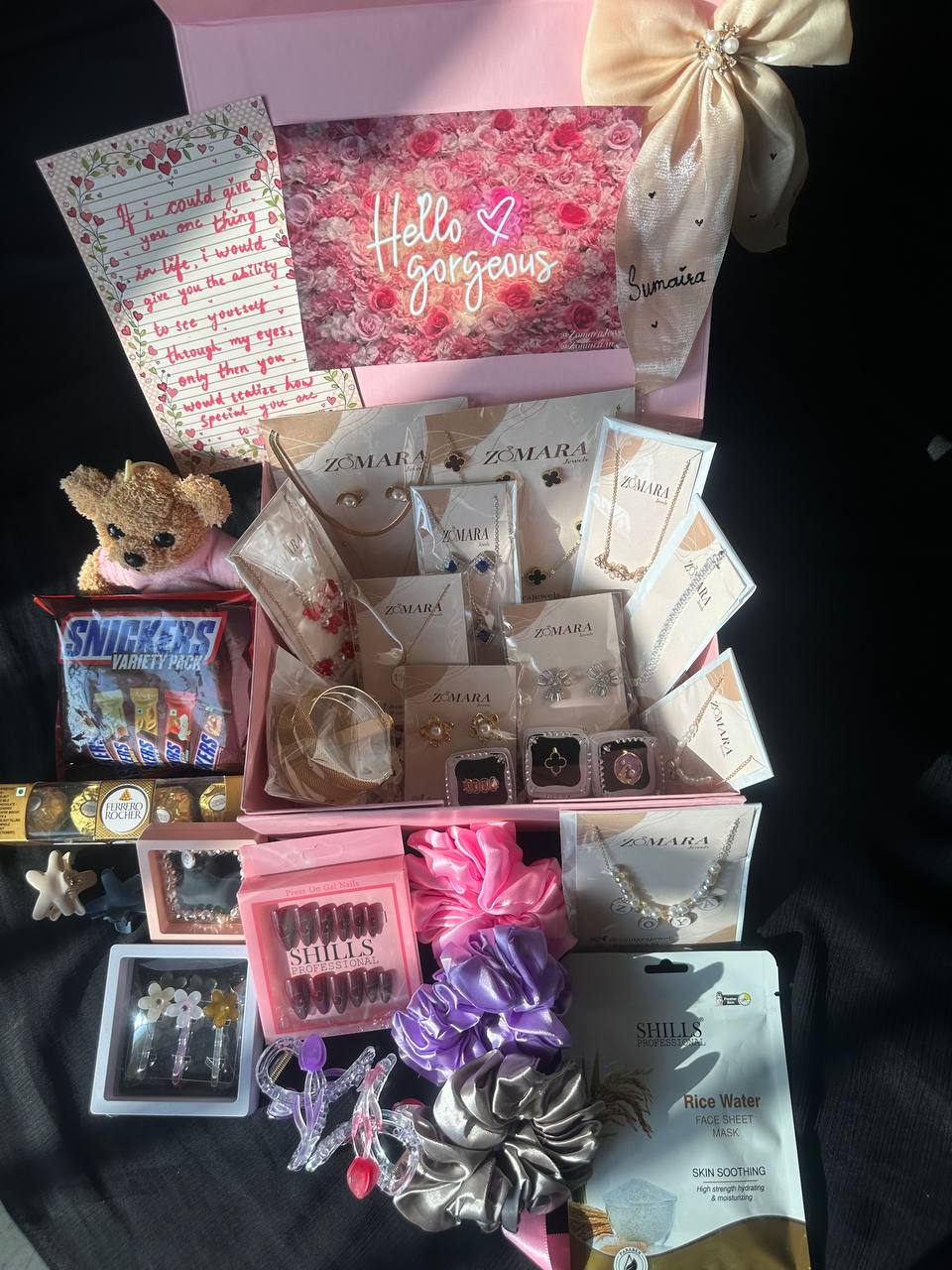 Blush Luxury Gift Hamper box featuring jewelry, snacks, and beauty products for a premium gift experience.