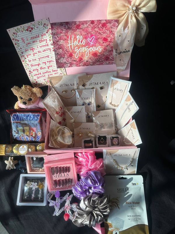 Blush Luxury Gift Hamper box featuring jewelry, snacks, and beauty products for a premium gift experience.