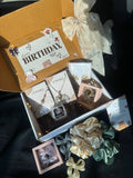 Elegant Love Gift Hamper - a beautifully arranged birthday gift box with jewelry and accessories.