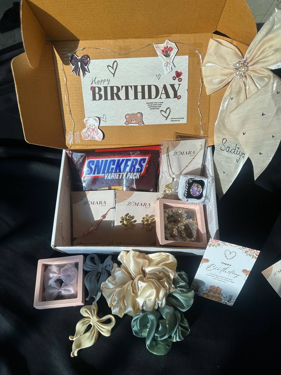 Elegant Love Gift Hamper - a beautifully arranged birthday gift box with jewelry and accessories.