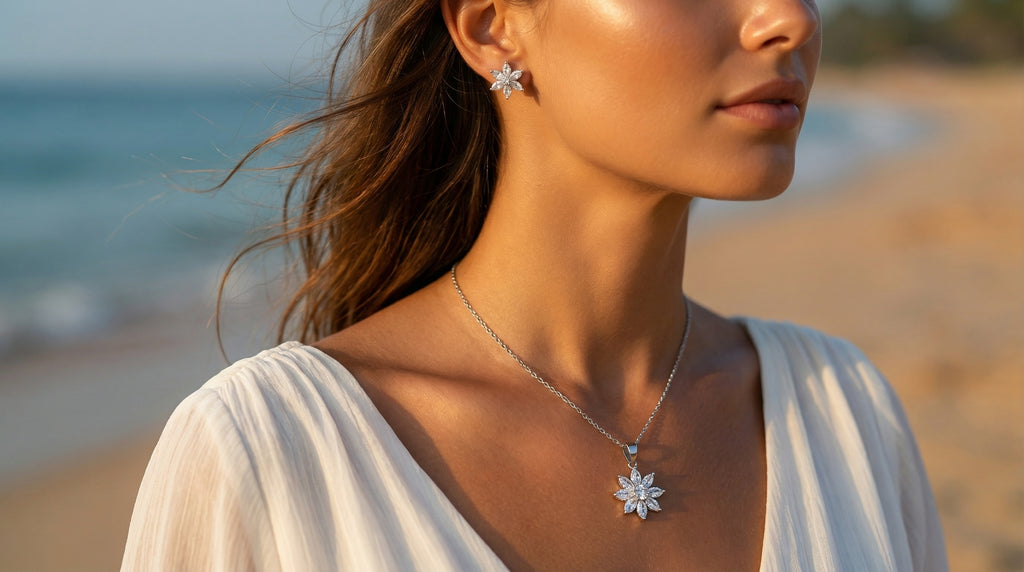 Woman wearing a necklace with a star-shaped pendant on a beach