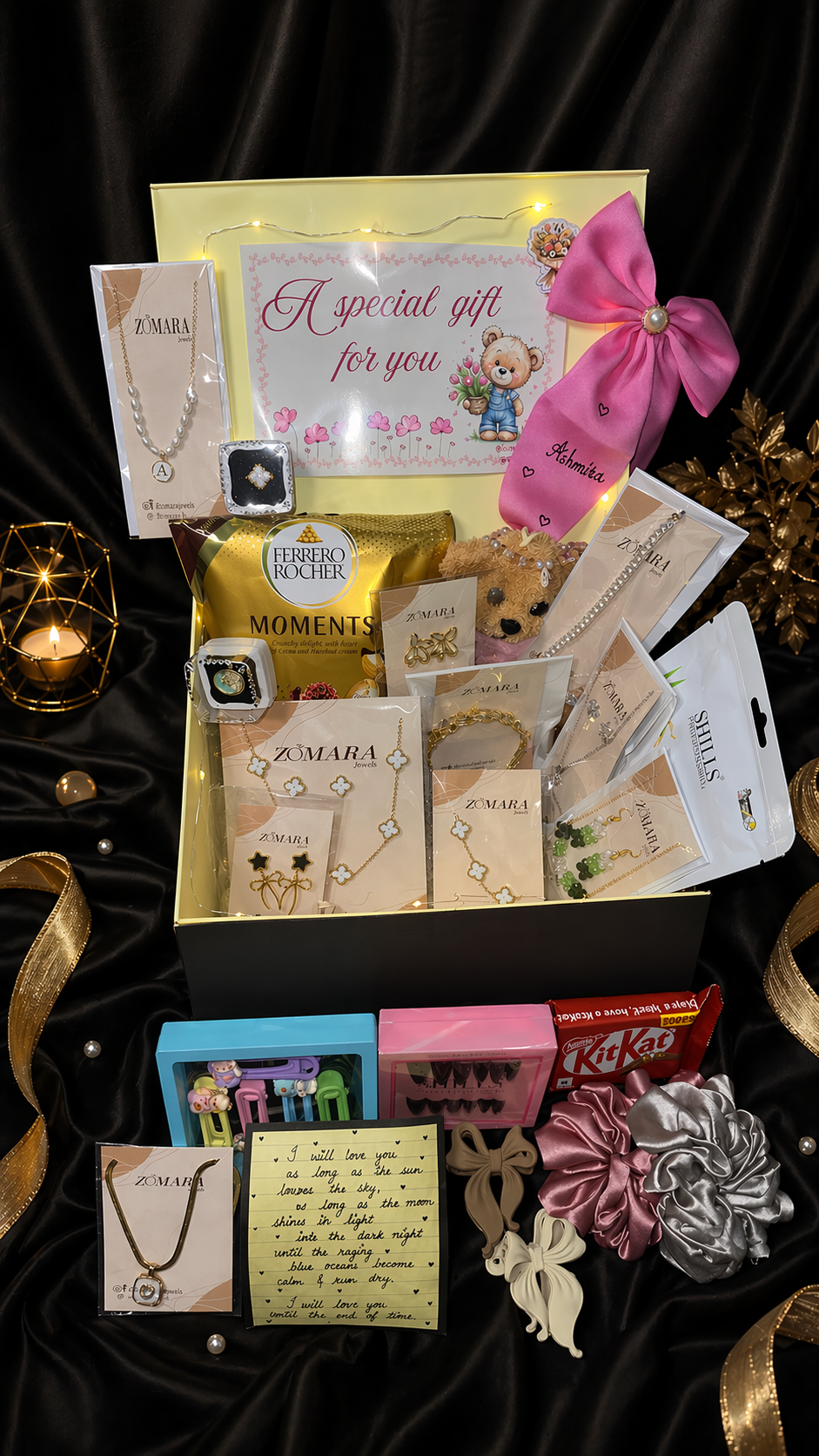 Gift box with various items including jewelry and snacks on a dark background