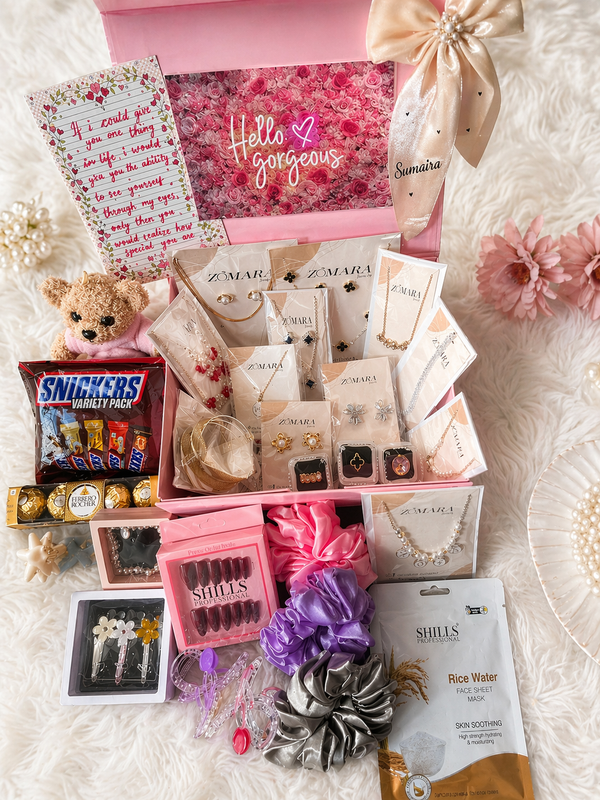 Blush Luxury Gift Hamper box featuring jewelry, snacks, and beauty products for a premium gift experience.