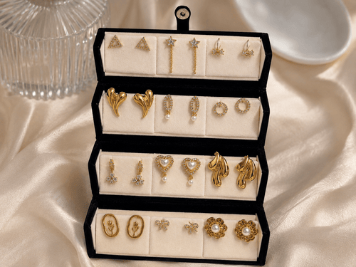 12-pair gold-tone statement and stud earring set displayed in an elegant gift box, alternate view