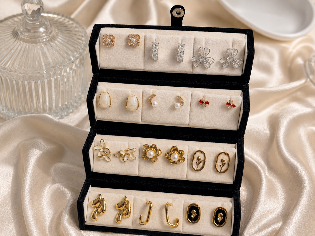 12-pair vintage floral and pearl gold-tone earring set displayed in an elegant gift box