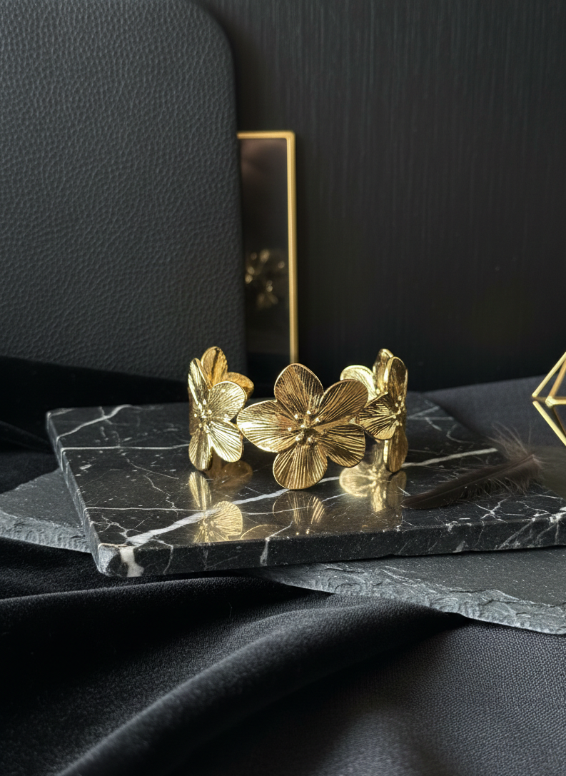 Classic Everyday Bracelet – ₹299, elegant gold flower bracelet on marble surface, perfect for daily wear.