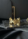 Classic Everyday Bracelet – ₹299, elegant gold flower bracelet on marble surface, perfect for daily wear.