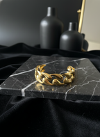 Classic Everyday Bracelet – ₹299 displayed on a marble surface with elegant vases in the background.
