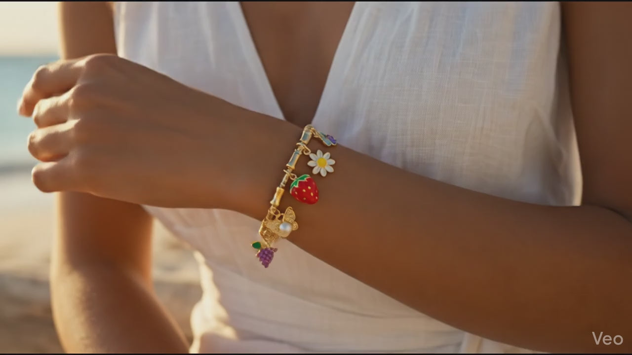 Woman on a beach wearing colorful bracelets with a blurred ocean background