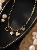 Golden Charm Link Necklace with Moon, Shell, Heart & Butterfly